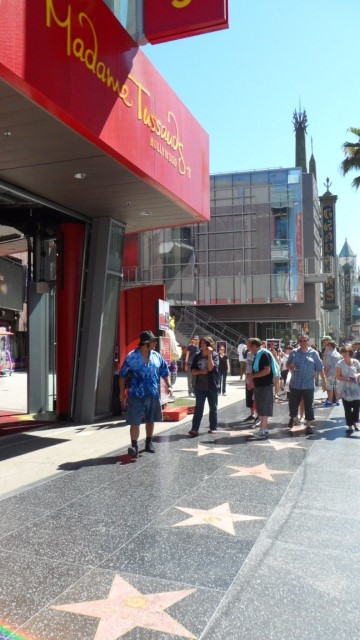 Tourists on the Hollywood Walk of Fame