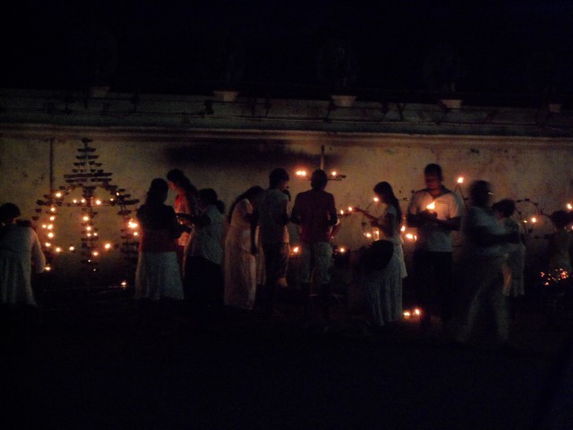 Devotees at Kataragama Temple lighting candles