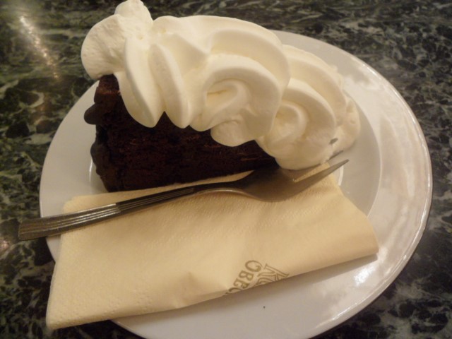 Traditional sachers cake with whipped cream (Municipal House Cafe Prague)