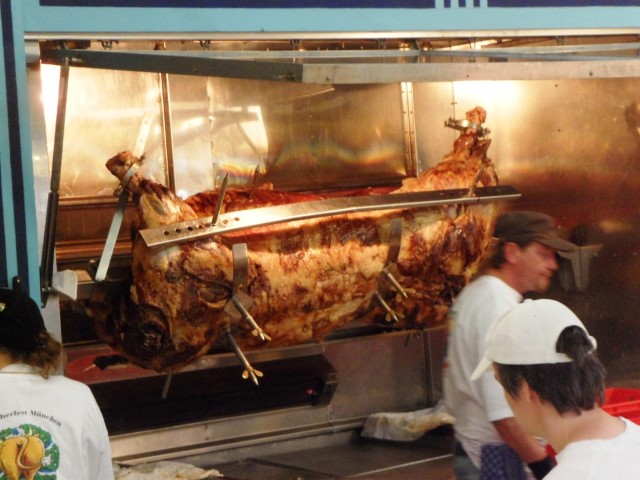 Have you seen anything like that? - A full grown pig being roasted at Oktoberfest