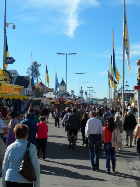 First view of Oktoberfest (Notice that people have their backs facing us as they've just entered the festival as well)
