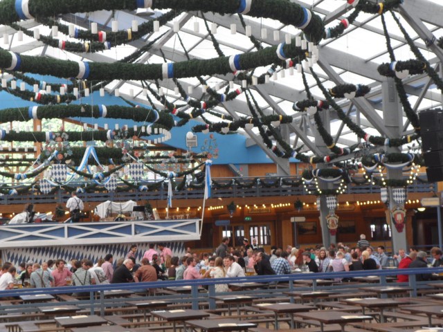 Inside Oktoberfest Munich Schottenhamel Beer Tent with location of Band such that everyone can see them