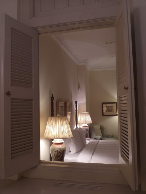 Sneak peak of bedroom in Raffles Hotel Suite