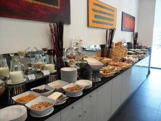 Downtown Restaurant Intercontinental Warsaw Breakfast spread of cereals and bread