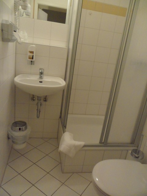 Clean toilet with hot water at Hotel Amelie Berlin