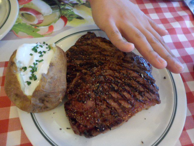 T-Bone steak with sour cream & garlic cheese for the potato