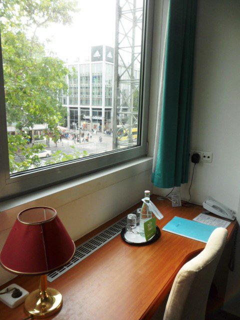 View of the main street from the living area from Berliner Hof Hotel