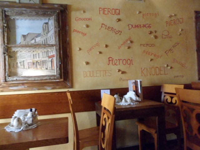 Interior of restaurant with many translation of the word "Dumpling"