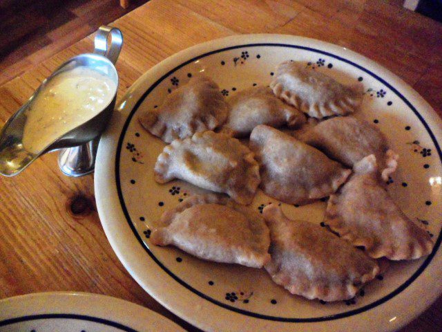 Spelt Pierogi with spinach leaves and cream cheese (24zl)