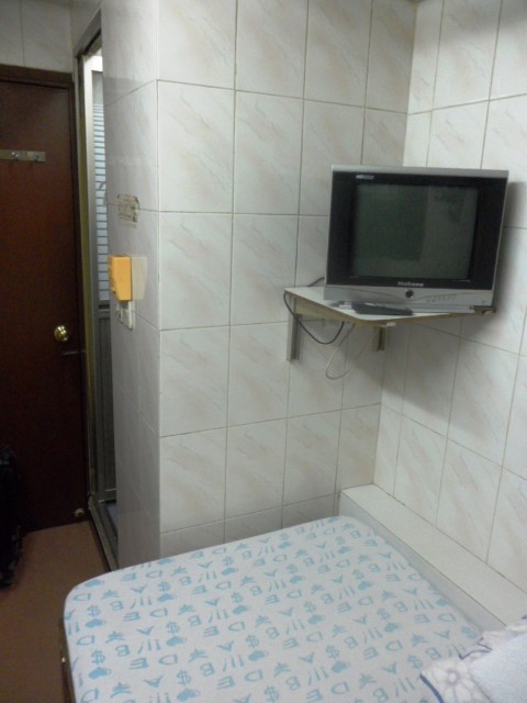Room with TV and attached Toilet at Yan Yan Guesthouse