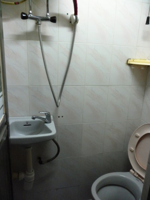 Shower and toilet in room of New China Yan Yan Hostel