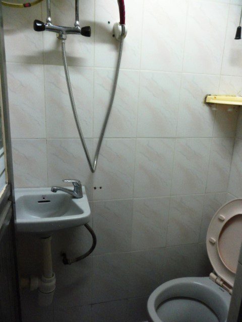 Shower and toilet in room of New China Yan Yan Hostel