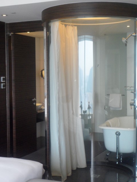 Bathtub and shower capsule with view of Tsuen Wan Harbour
