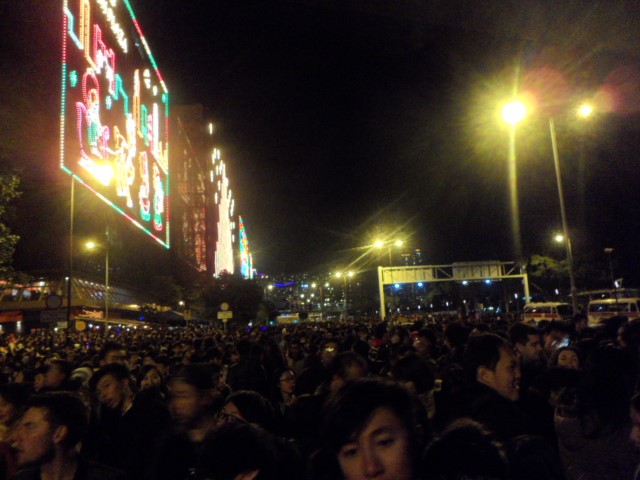 Crowd waiting for fireworks and countdown at Victoria Harbour Hong Kong