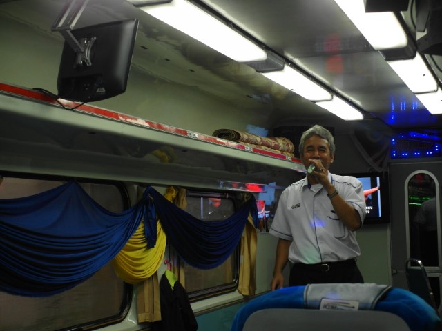 Enjoying a moment of Karaoke Singing onboard KTM train to Kluang