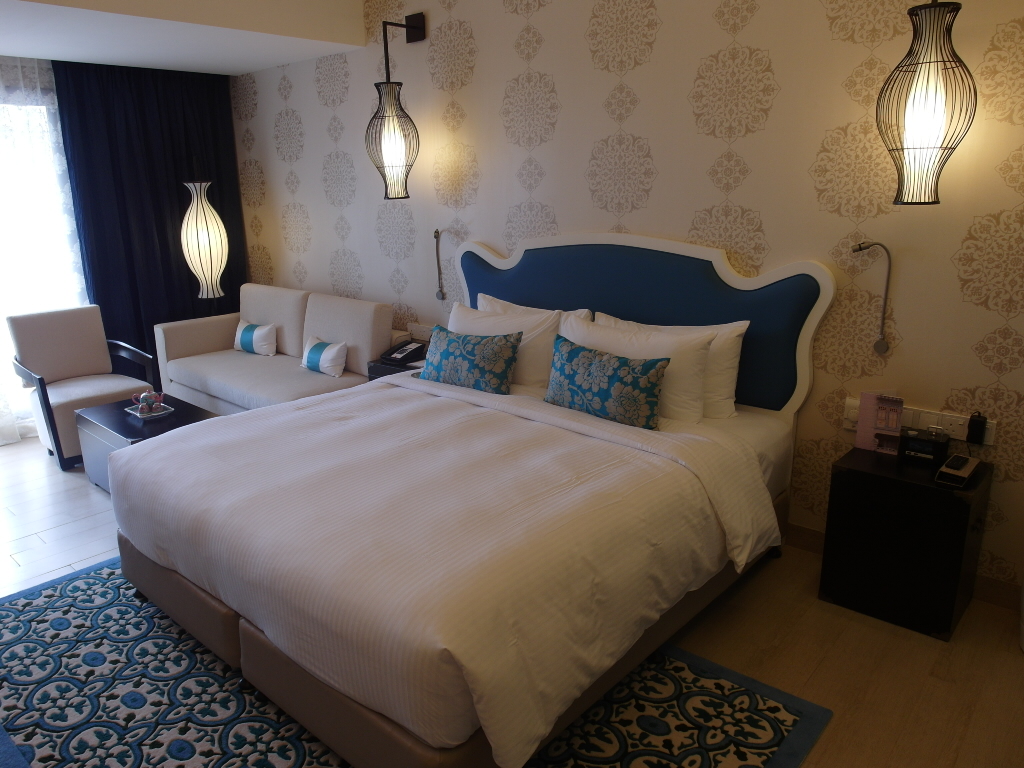 Elegant blue bed of Club Room Village Hotel Katong Singapore Staycation