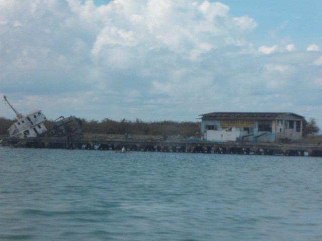 Is that really University of Cebu? Next to it - A grounded vessel