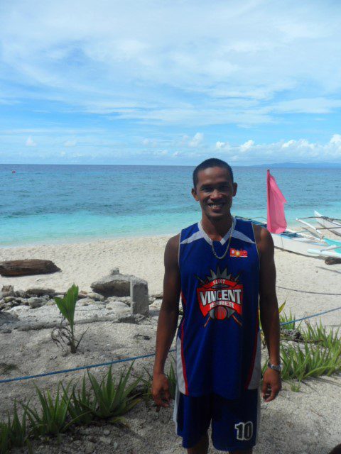 Our Guide at Balicasag who worked very hard to steer our boat and look for interesting fish turtles at the edge of the corals