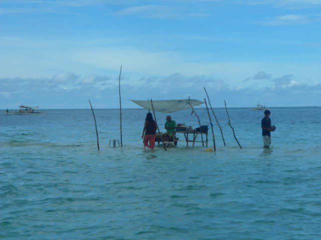 Temporary stalls at the sand bar of Virgin Island