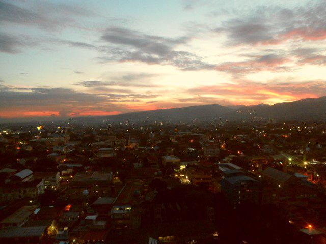 Sunset and Tops Hill seen from our room at Ramos Tower City Suites