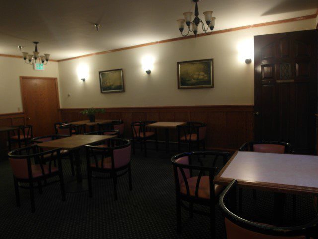 Inside small dining area of Eureka Inn for breakfast overlooking the pool 