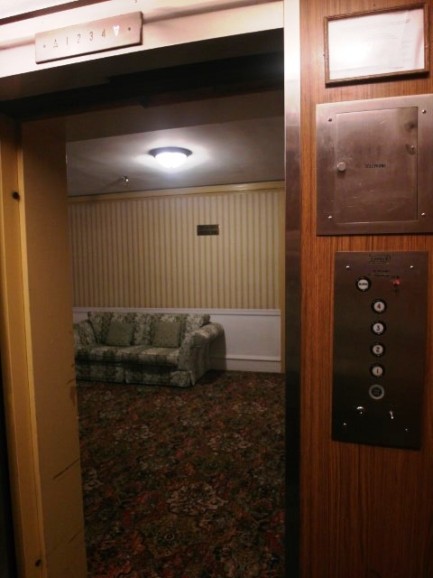 Old lift with old buttons in Eureka Inn