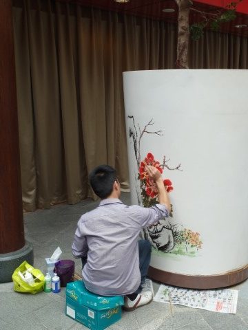 Chinese paintings done manually in the hotel's lobby!