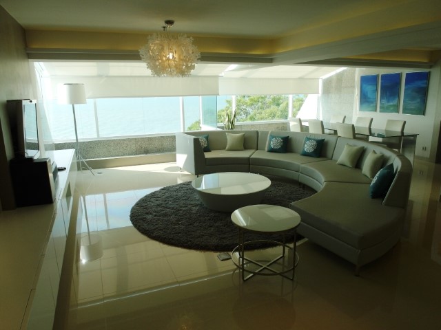 HUGE semi-circular sofa with sea views as centre piece of the Platinum Presidential Suite