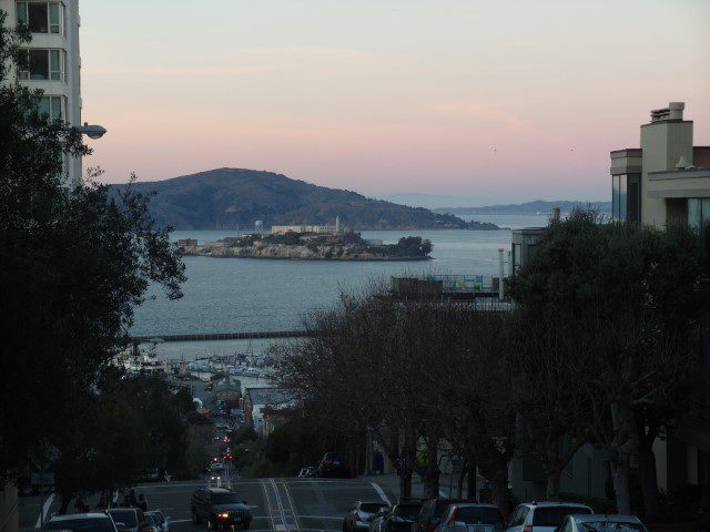 Alcatraz Federal Prison seen at the top of Lombard Street - Crookedest Street in San Francisco