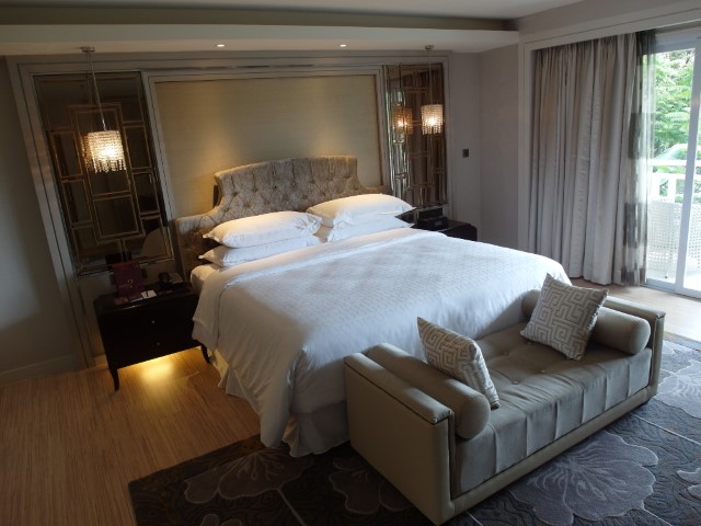 Classy and inviting bedroom of the Presidential Suite