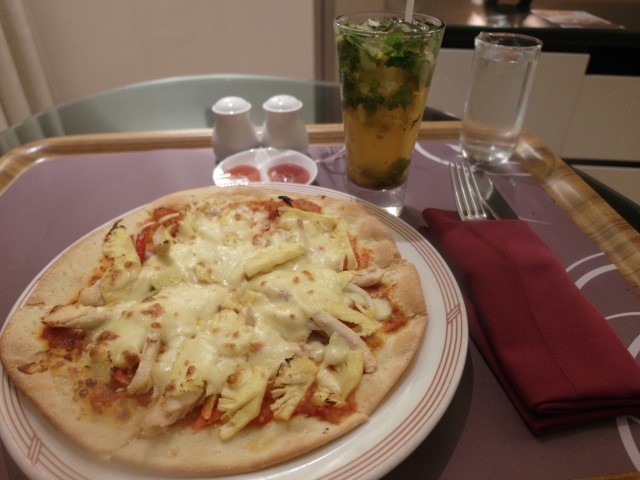 Hawaiian Pizza (the ones with thin crust!) with a glass of chilled Mojito
