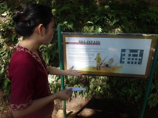 Intan translating the introduction of the Japanese caves to us