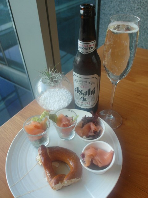 Asahi beer with pretzels (plus honey) and smoked salmon