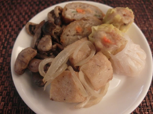 Dim sum and stir fried items such as mushrooms and diced chicken