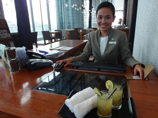 Janice checking us in at Oasia Hotel’s Club Lounge – The Living Room!