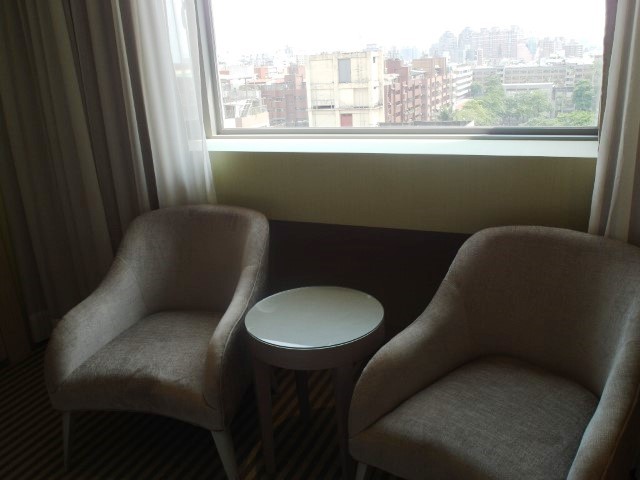 Taichung city view by the window with comfortable chairs