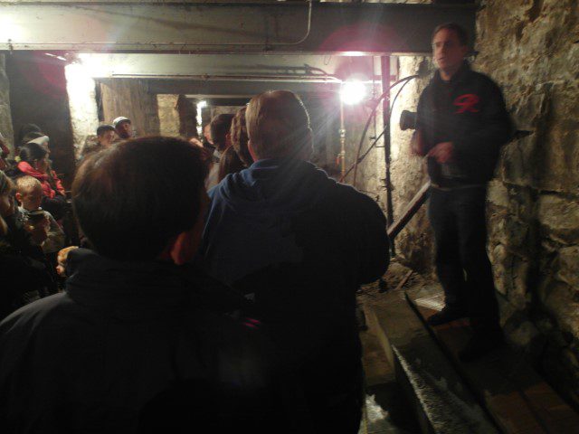 Notice the wall behind Dave - Seattle Underground Tour