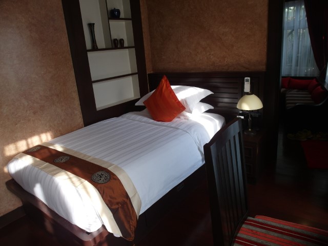 Smaller room with attached bathroom and in-room TV at De Sarann Villa Siem Reap