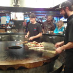 The master chefs at work on a grill similar to the mongolian grill / Teppanyaki concept