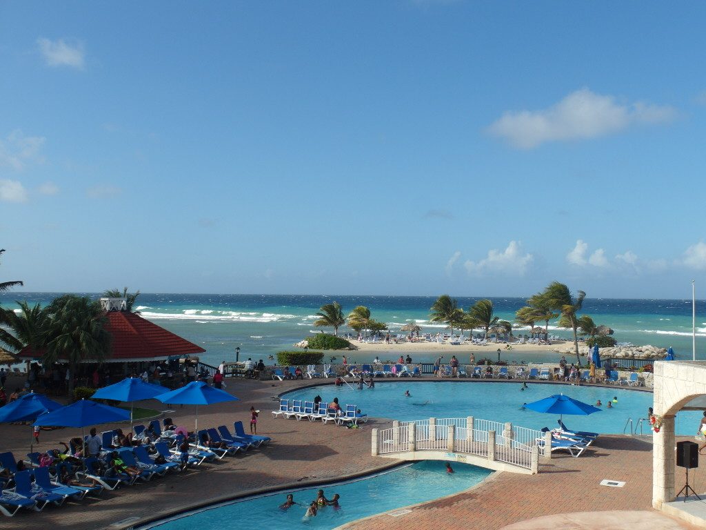 Swimming Pool by the Caribbean Sea @ Holiday Inn Resort Montego Bay