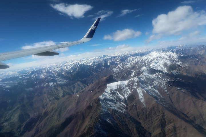 Flying over the Himalayan Mountain Range from Leh to Delhi