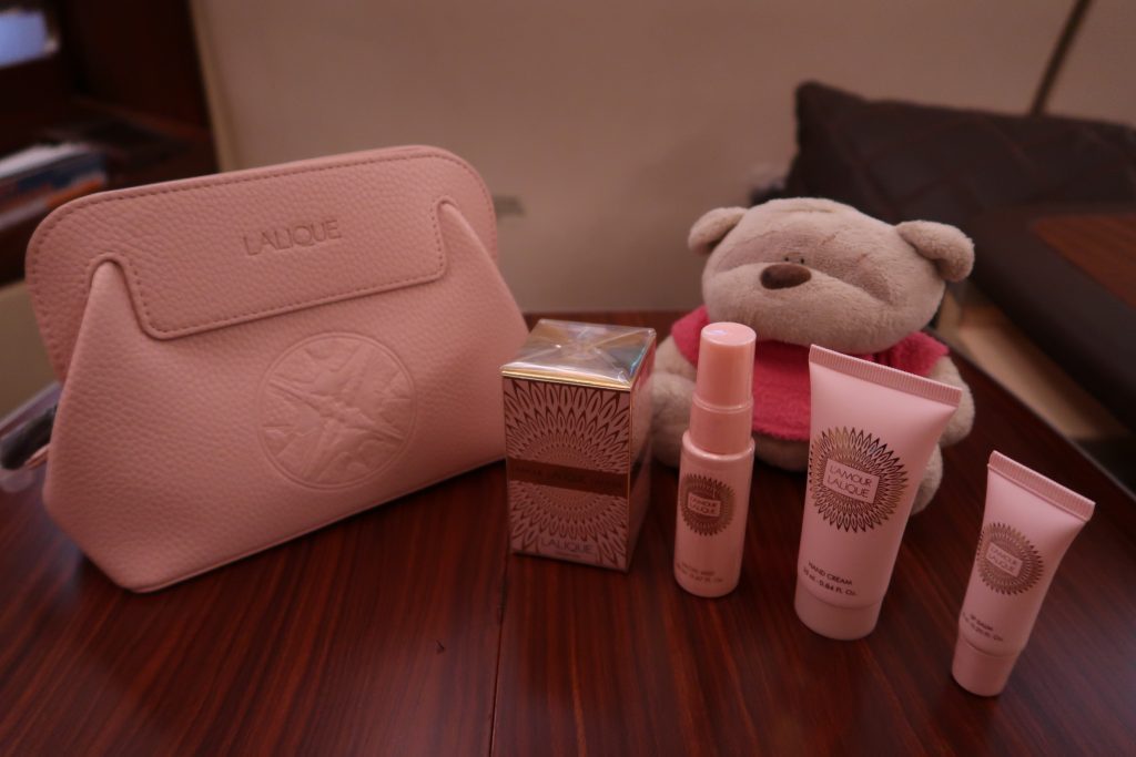 SQ First Class Suites Lalique Amenities for Ladies including perfume, hand cream, lip balm and facial mist