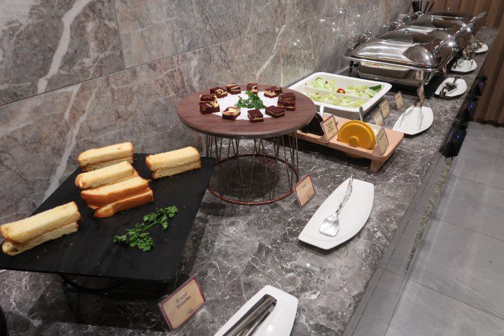 Cake and salad in Changi Lounge Singapore