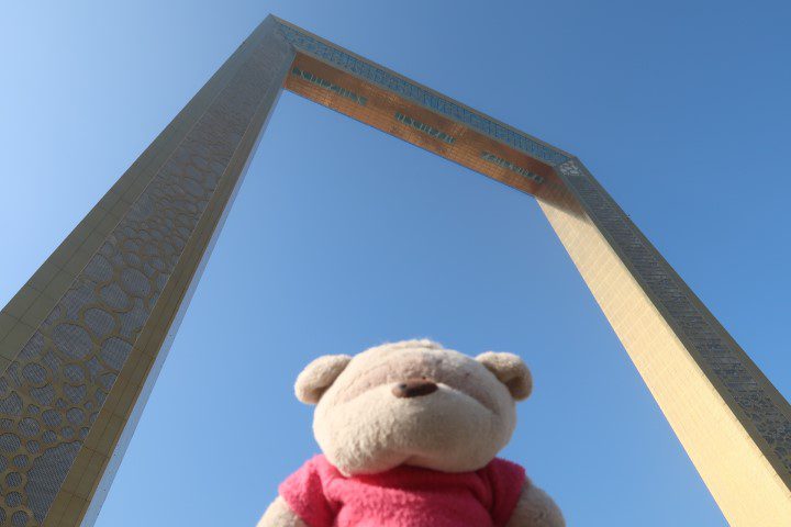 Kate doing a selfie with Dubai Frame