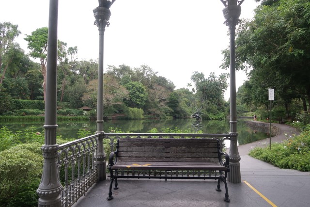 Taking a break and fresh morning air at the pavilion next to Swan Lake of Singapore Botanic Gardens