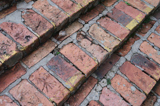 Mark on bricks used by WW2 POWs at Singapore Botanic Gardens