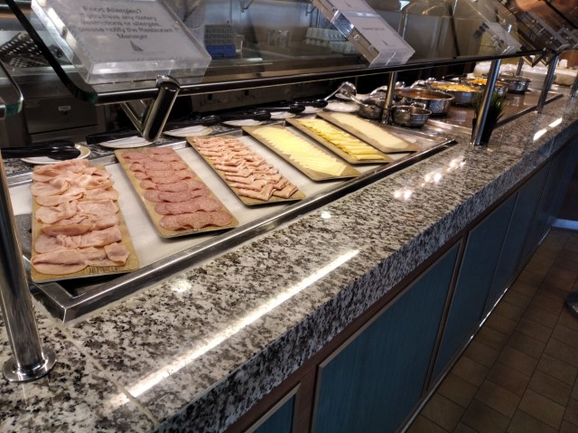 Cheese and hams at Windjammer Breakfast Buffet Quantum of the Seas