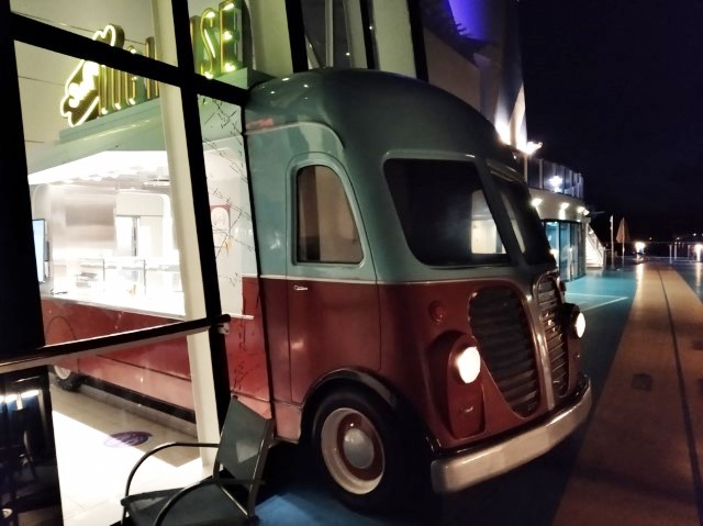 SeaPlex Dog House at Night with its protruding food truck (Quantum of the Seas)