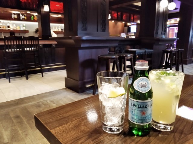 No-jito mocktail and san pellegrino sparkling water from Harp and Horn Quantum of the Seas