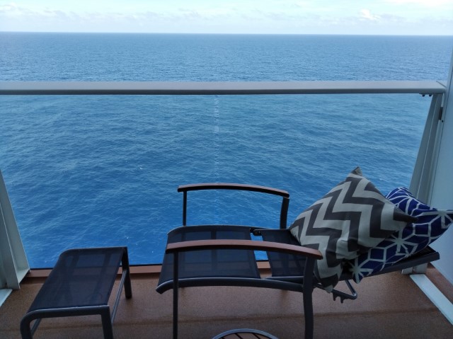 Fully reclined deck chair in balcony state room of Quantum of the Seas